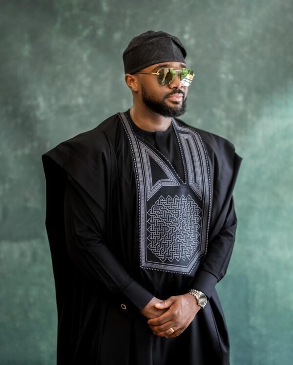 Man wearing a Black Agbada with mordern Embroidery Design