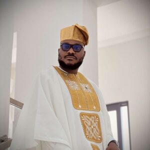 Wedding in a White Agbada with Gold Embroidery